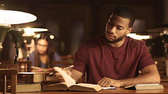 Nigerian man studying for verbal reasoning test